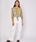 Blusa Derhy mostaza a contraste. - Imagen 1