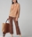 Pantalon Oky acampanado cropped punto marrón . - Imagen 1