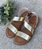 Sandalia HEEE SHOES tiras cruzadas vaquetilla metalizada dorada. - Imagen 1