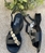 Sandalia Plumers Menorca 3774 plana monedas negra - Imagen 2